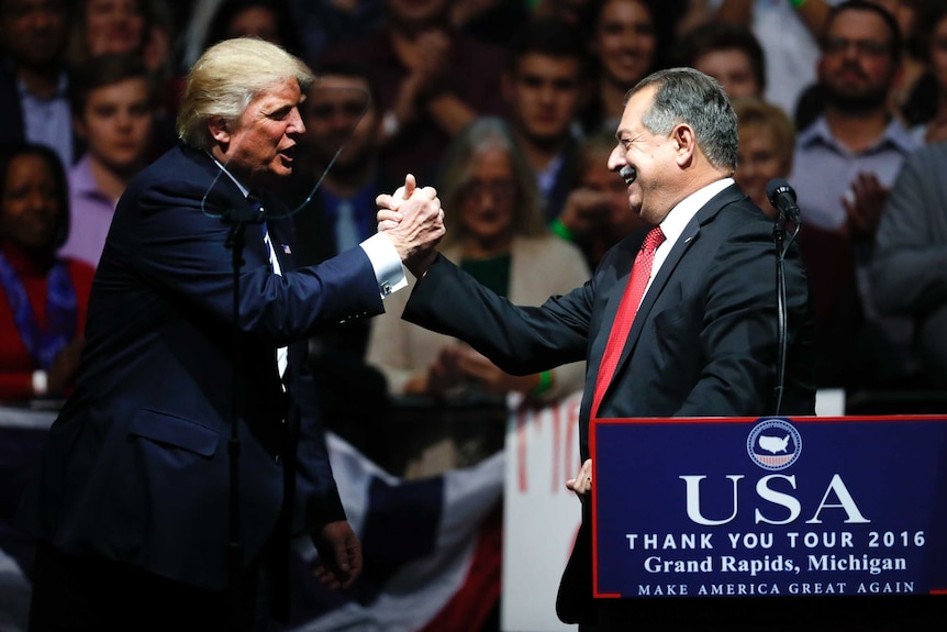 US President-elect Donald Trump and Dow Chemical Company chairman Andrew Liveris