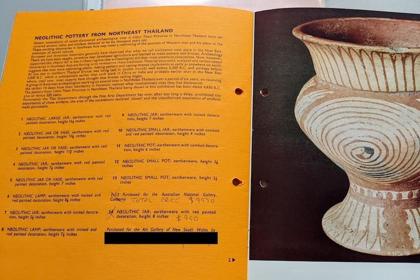 An exhibition catalogue with a ceramic pot