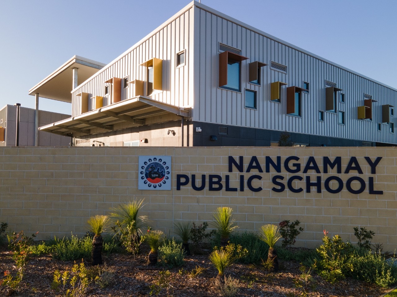 exterior of school with sign