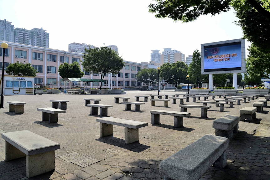 An empty street in front of Pyongyang station in North Korea.