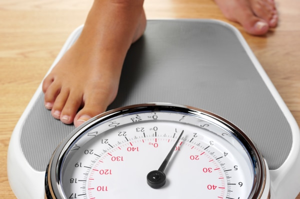 A persons foot a on set of scales