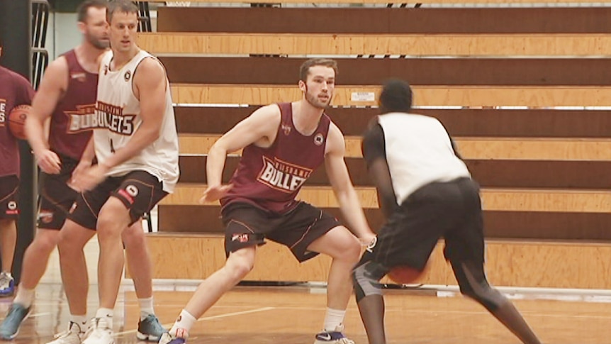 Jarred Bairstow [centre] at training with the Brisbane Bullets