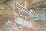 An ochre-coloured rock art painting of a boat carrying people.
