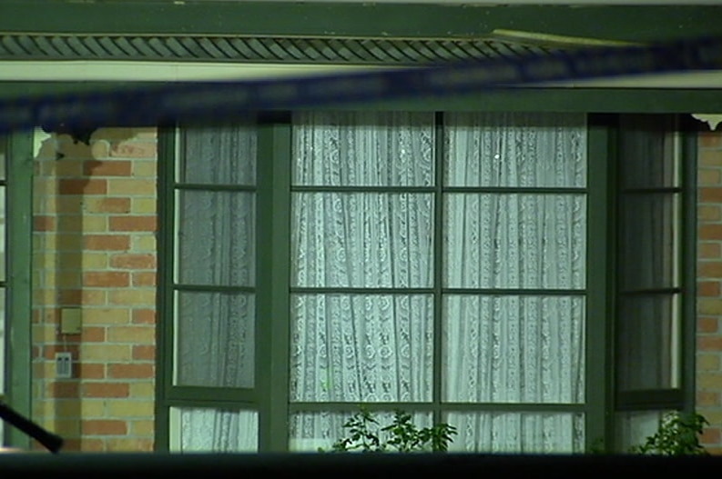 Exterior view of a window at the rooming house.