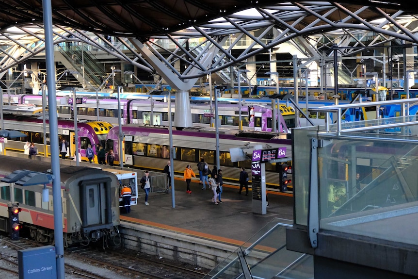 Commuters at Southern Cross Station in Melbourne.