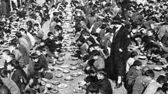 Australasian Orphanage, Antelias - Hilda King from Melbourne supervises mealtime (Image courtesy of Missak Kelechian)