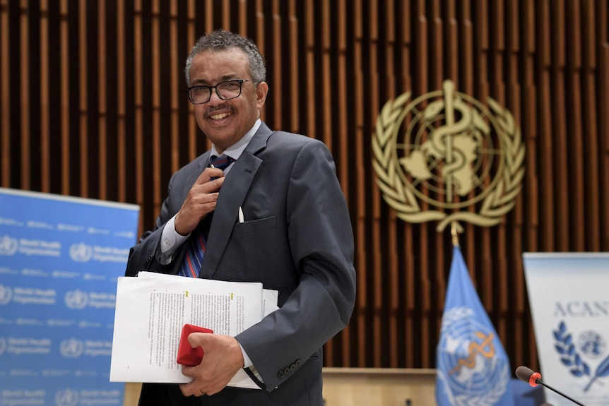 WHO Director-General Tedros Adhanom Ghebreyesus leaves a news conference