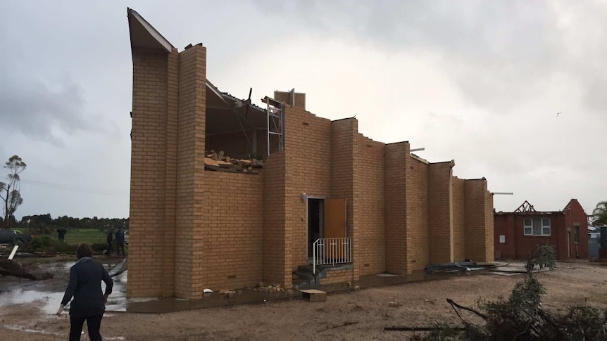 A damaged brick church.