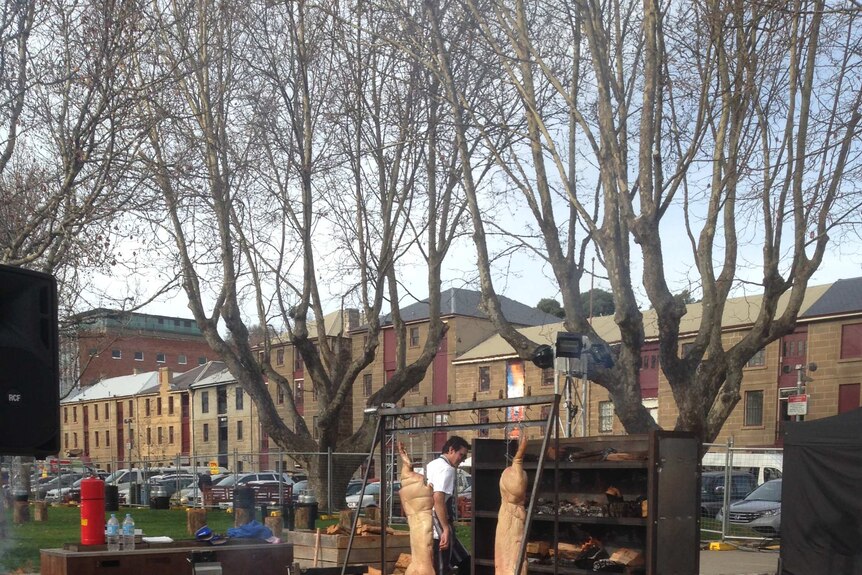 Chef Jared Ingersoll preparing a giant barbecue for tonight's Dark Mofo winter feast