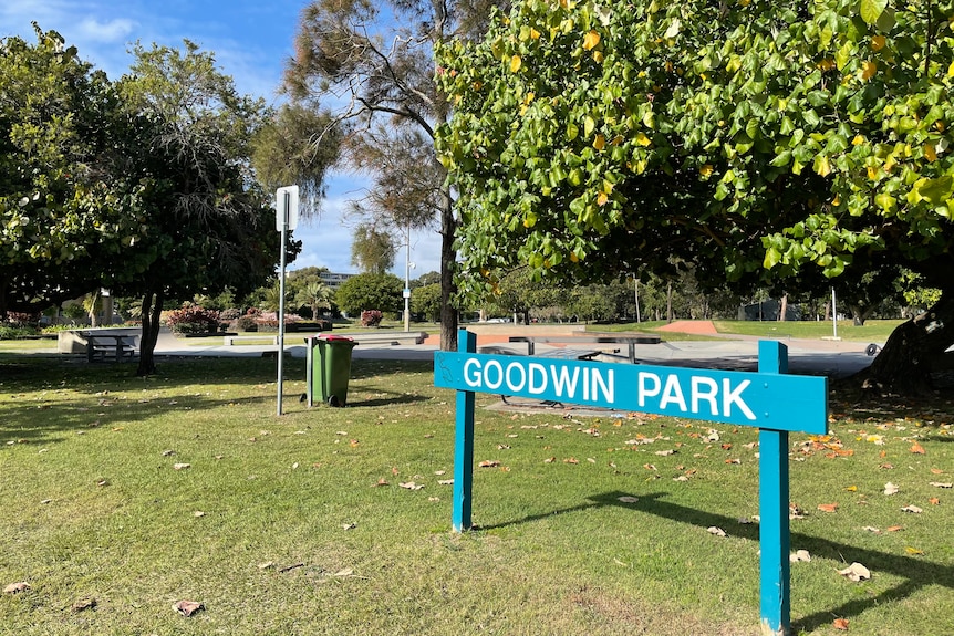 A sign outside a park saying "Goodwin Park".