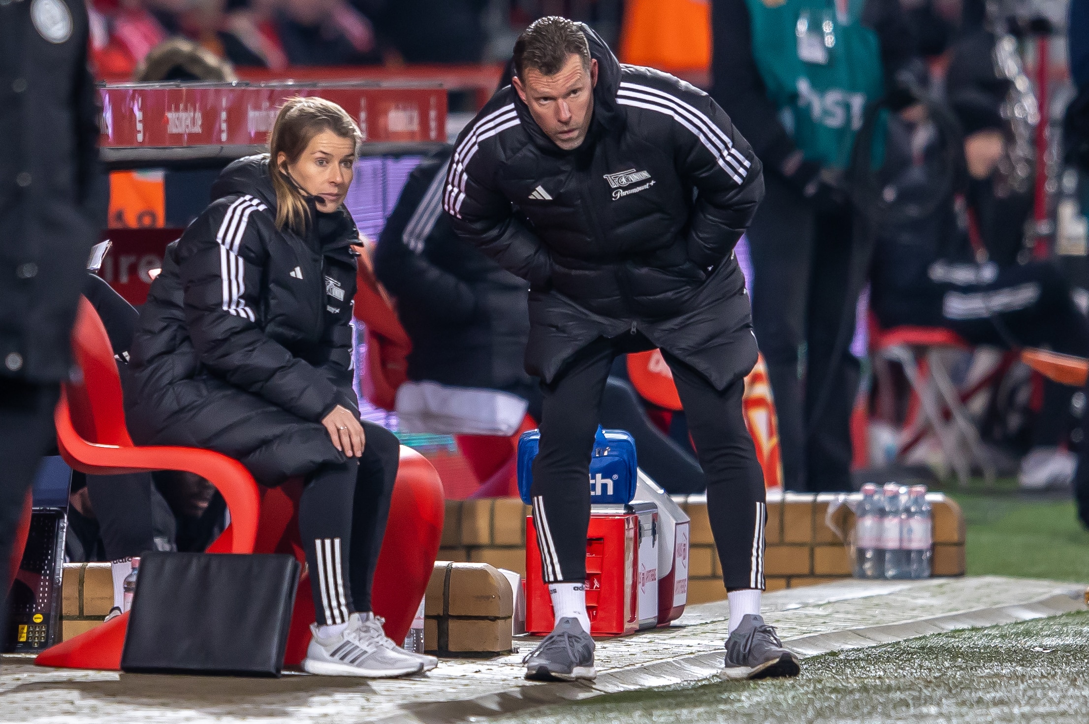 Marie Louise Eta sits on the bench