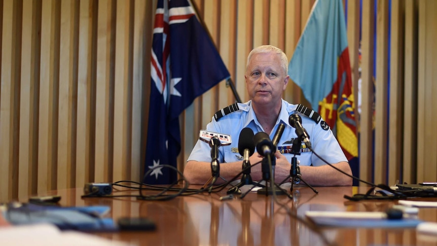 Chief of the Defence Force Air Vice Marshal Mark Binskin sits at a press conference