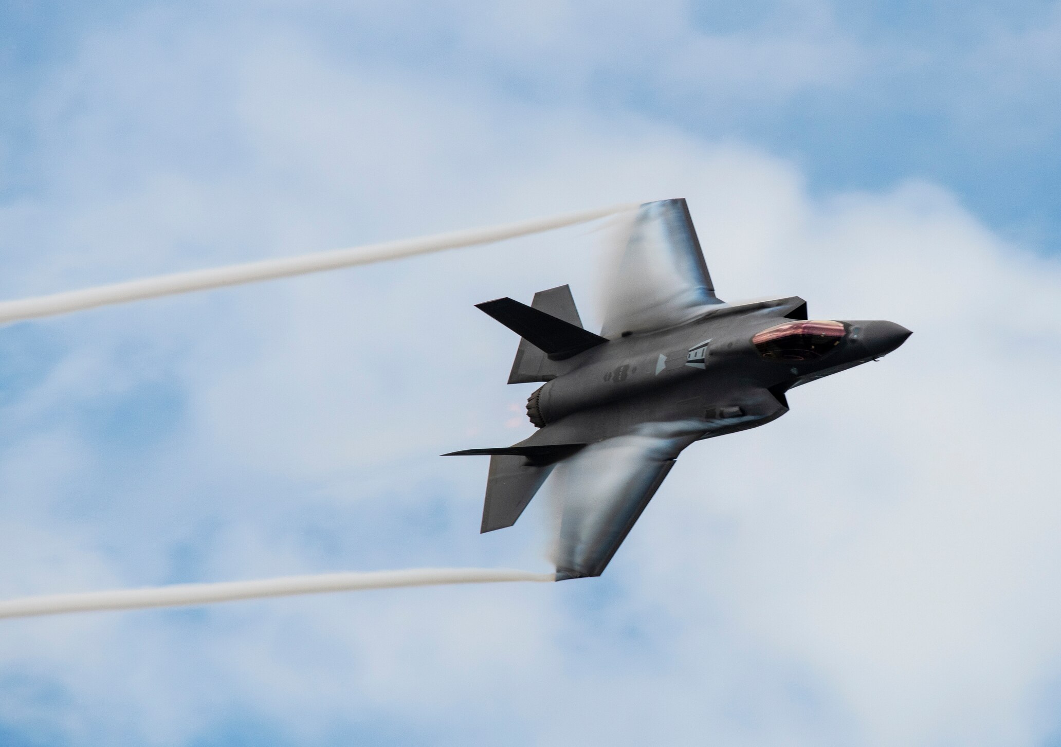  F35-A Lightning 2 aircraft performing a high speed, low altitude flyby