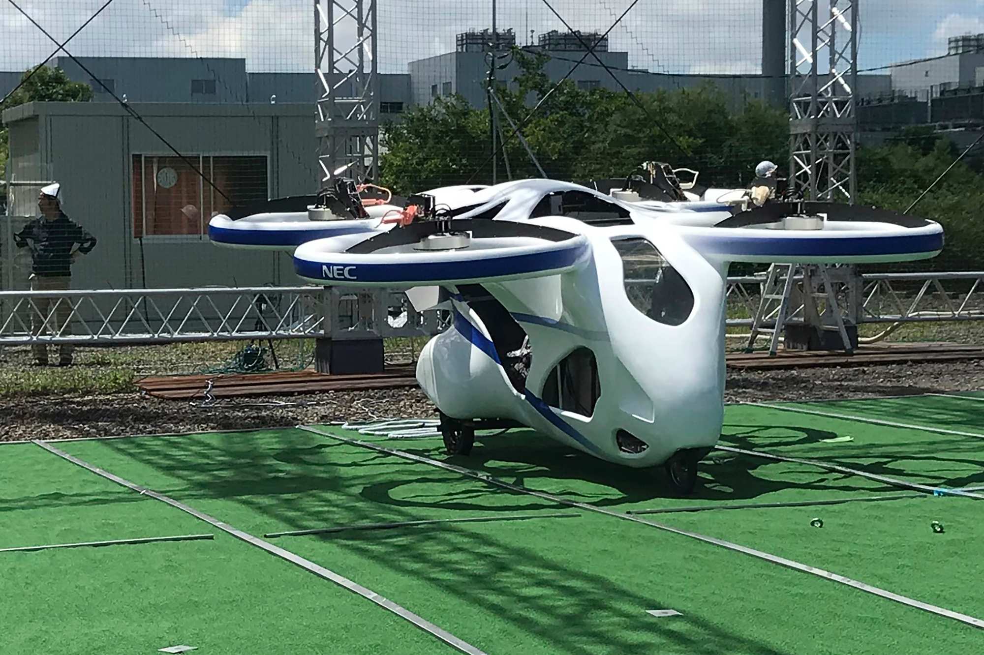 Flying car' hovers steadily in test flight by Japanese electronics
