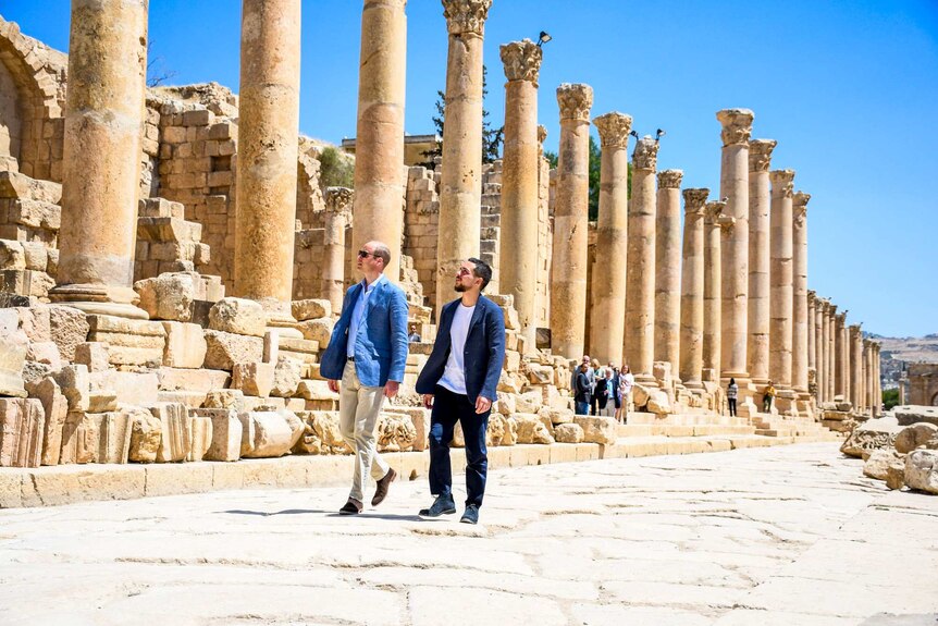 Britain's Prince William walks with Jordan's Crown Prince Hussein at the ancient city of Jerash in Jordan.