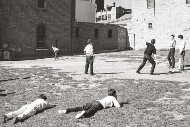 Boys play cricket at what is now Condell Reserve, in Fitzroy.