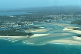 An aerial photo showing all of the sand build up in the mouth of the Noosa river.