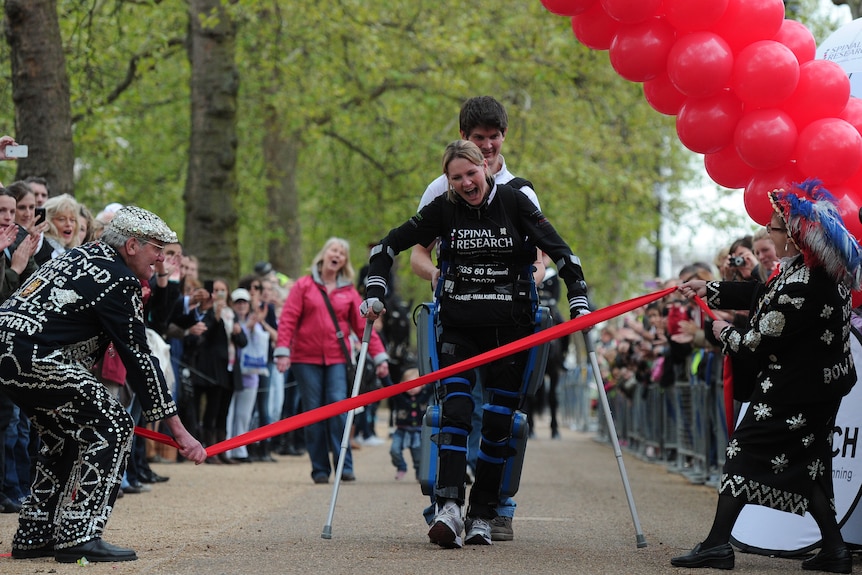 Woman completes marathon in bionic suit