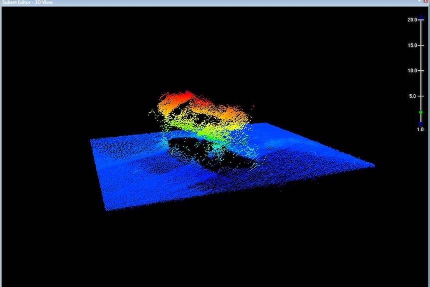 A 3d scan made up of coloured dots shows a shipwreck 