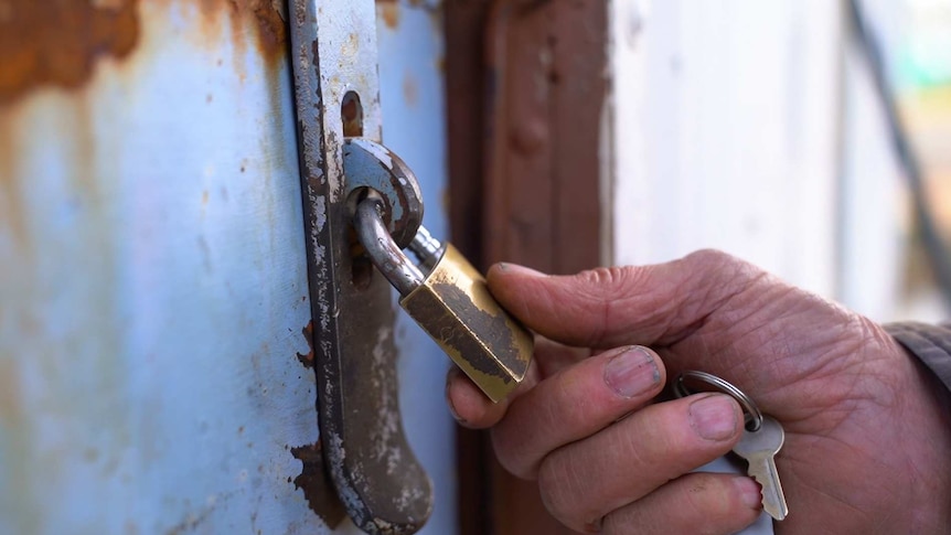 Maurice Henry locks workshop for the final time