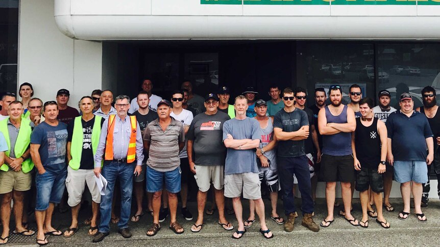 WE Smith workers standing outside the office of Luke Hartsuyker in Coffs Harbour.