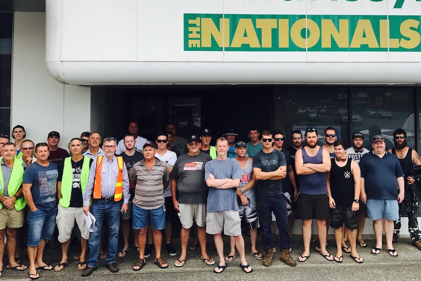 WE Smith workers standing outside the office of Luke Hartsuyker in Coffs Harbour.