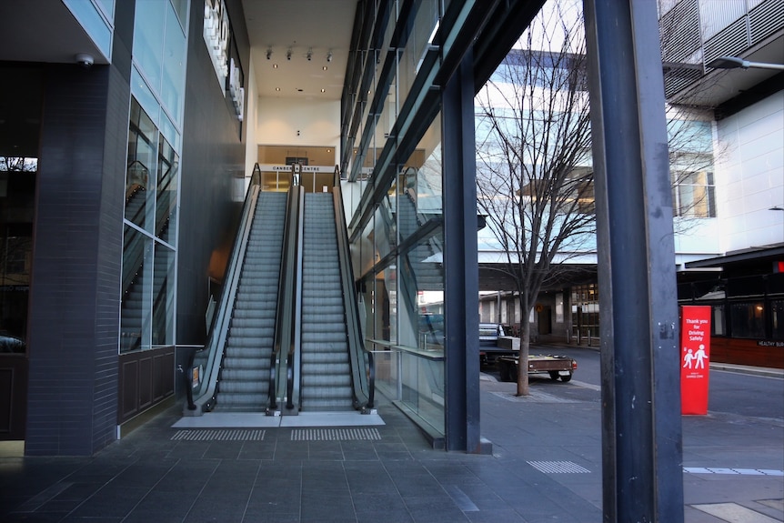 An empty escalator in Canberra's city centre.