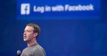 Mark Zuckerberg stands on a stage