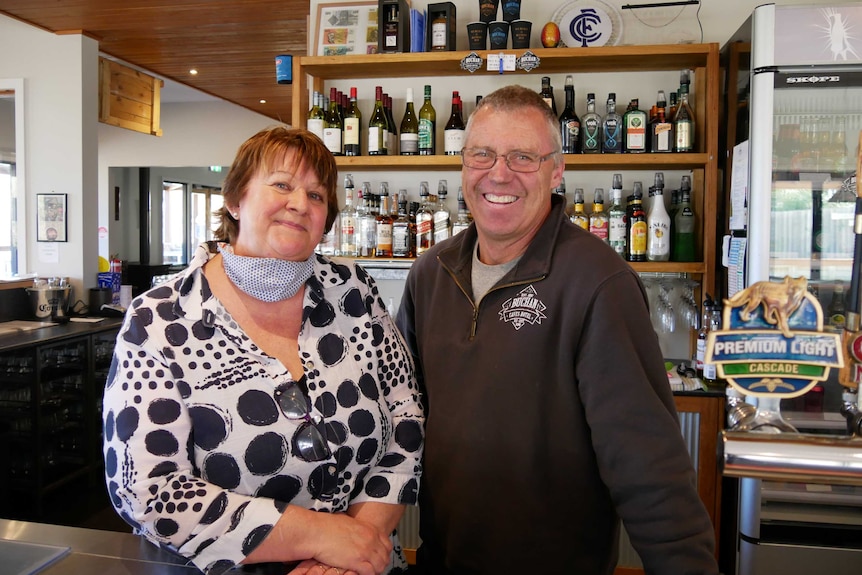 Marg and Greg Brick behind the bar at their pub in Buchan