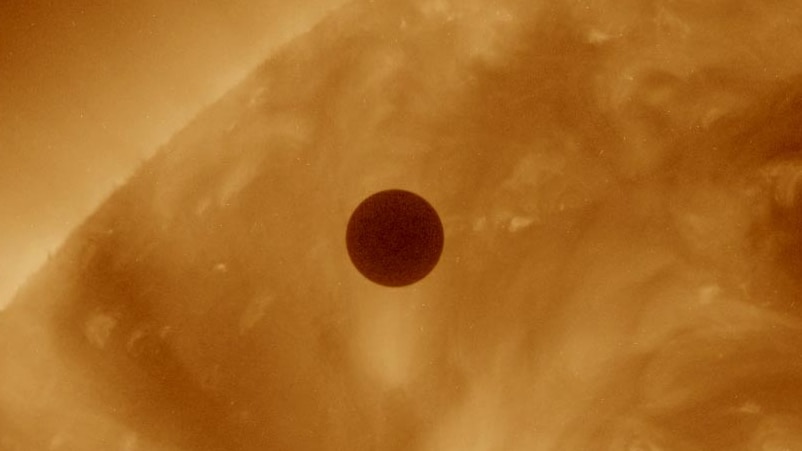 Venus passes between the Sun and the Earth.