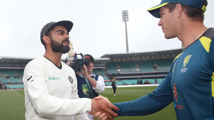 India captain Virat Kohli and Australia captain Tim Paine shake hands at the SCG after the Test series between their teams.