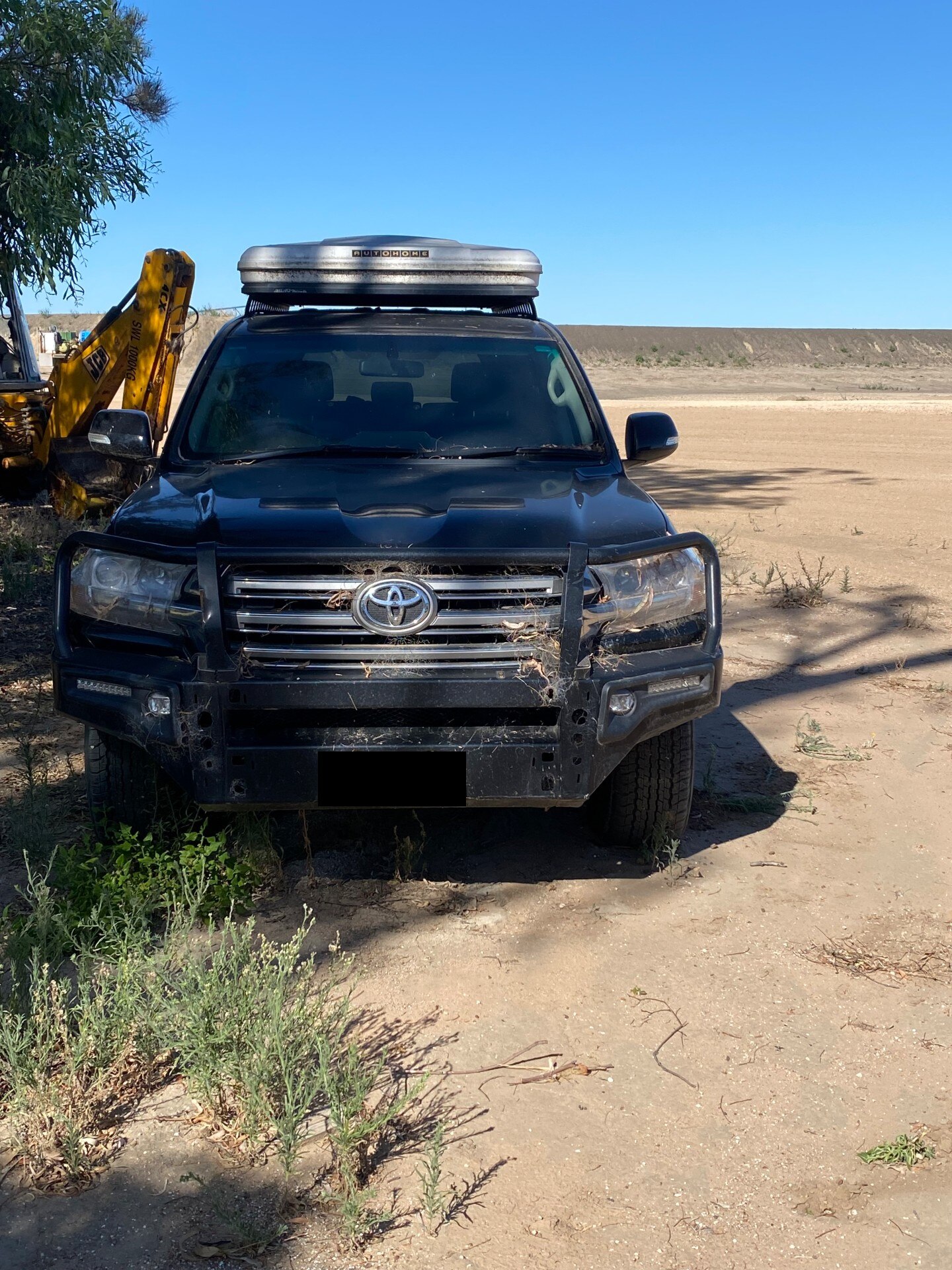 Landcruiser after being stuck in flood waters