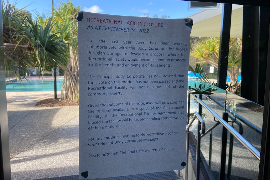 Signage on pool fencing outlines the closure details.