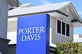 Blue sign reads Porter Davis