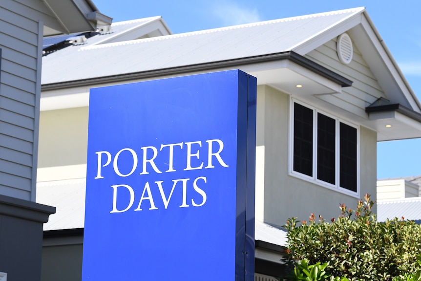 Blue sign reads Porter Davis