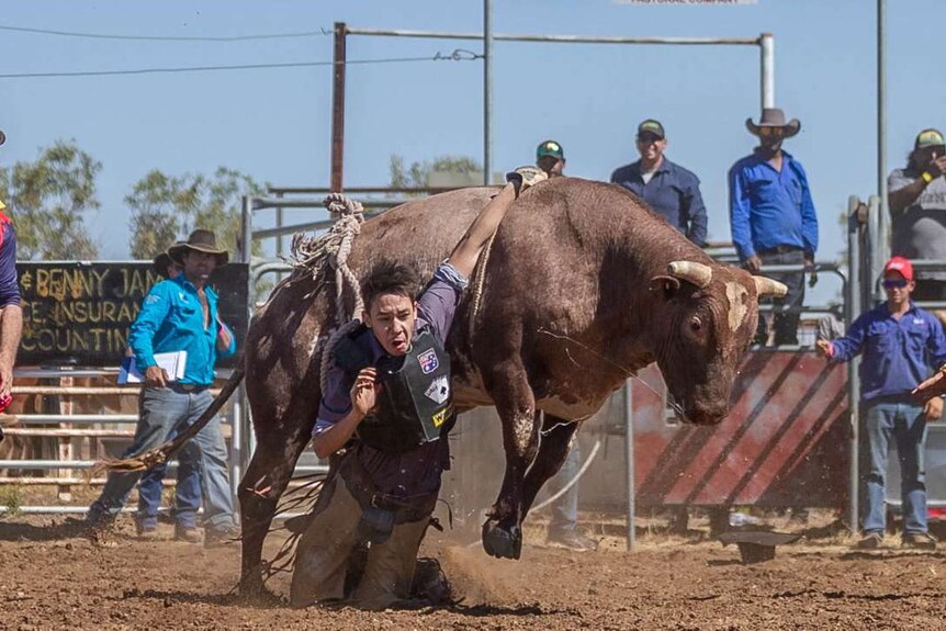A rider became trapped in his wrap at the Halls Creek rodeo last weekend.