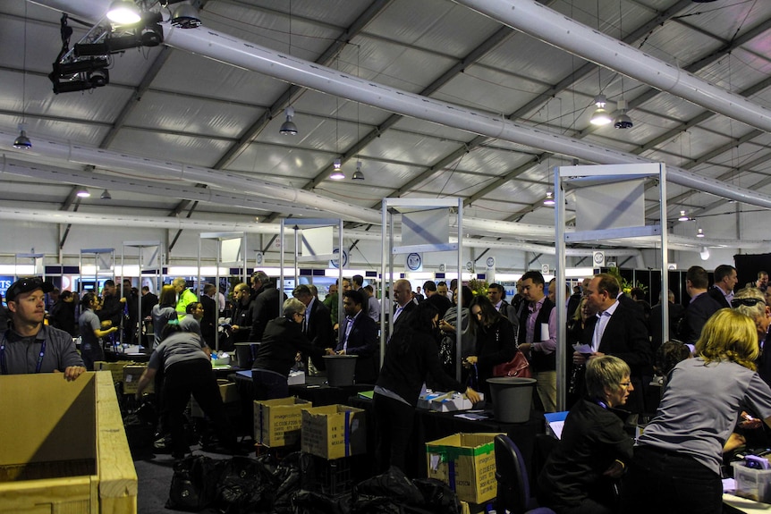 Image of delegates registering at the Diggers and Dealers Mining Forum.