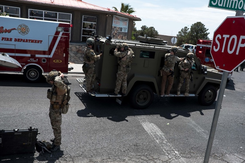 Law enforcement agencies respond to an active shooter at a Wal-Mart