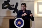 President of the Philippines Rodrigo Duterte attends a news conference.