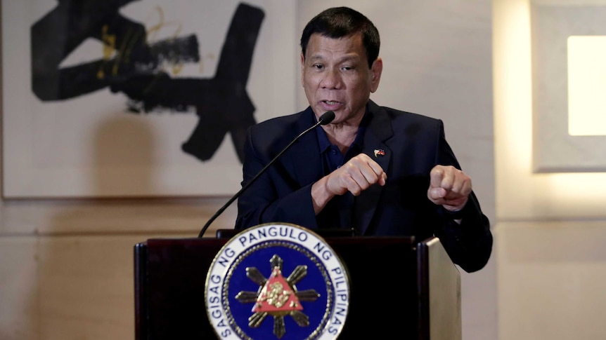 President of the Philippines Rodrigo Duterte attends a news conference.