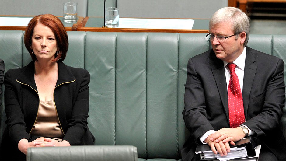 Kevin Rudd looks at Julia Gillard in Parliament