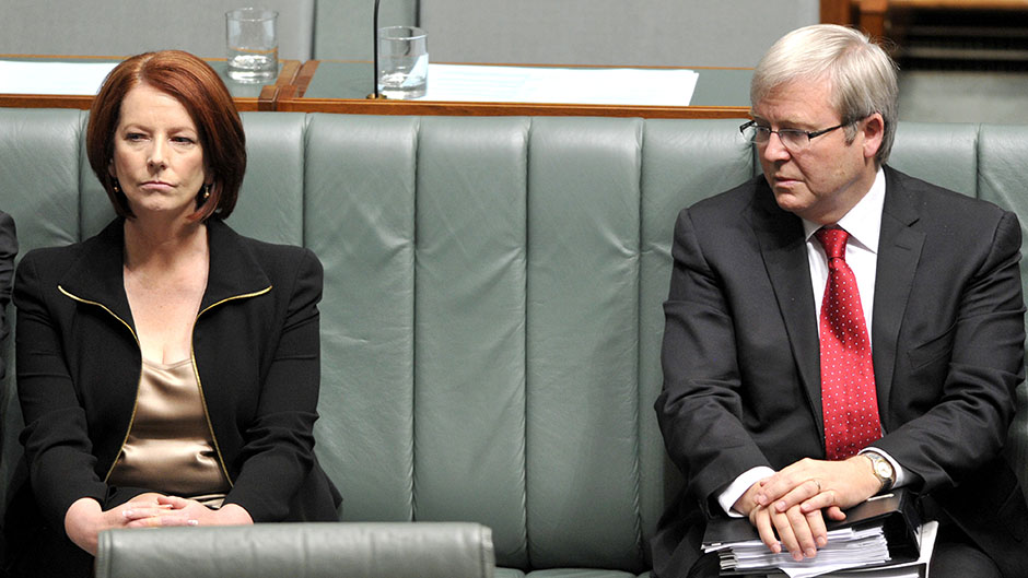 Kevin Rudd looks at Julia Gillard in Parliament