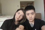 Rikki-Lee Romeyn and wife Jill Huang in COVID-19 hotel quarantine