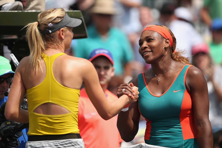 Serena Williams and Maria Sharapova shake hands after a match in Florida in 2014