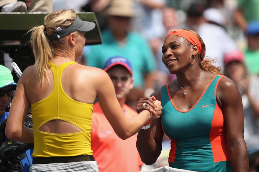 Serena Williams (R) shakes hands with Russian Maria Sharapova after her win in Florida in 2014.