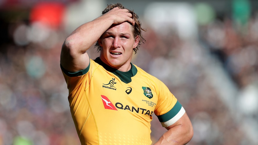 A Wallabies player stands with his right hand on his head during a Bledisloe Cup Test against New Zealand.