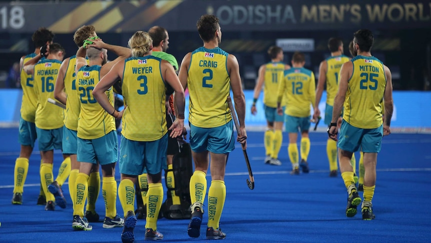 Australian players after their loss to Netherlands in the 2018 Men's Hockey World Cup semi-final.