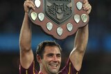 Cameron Smith holds the State of Origin shield aloft