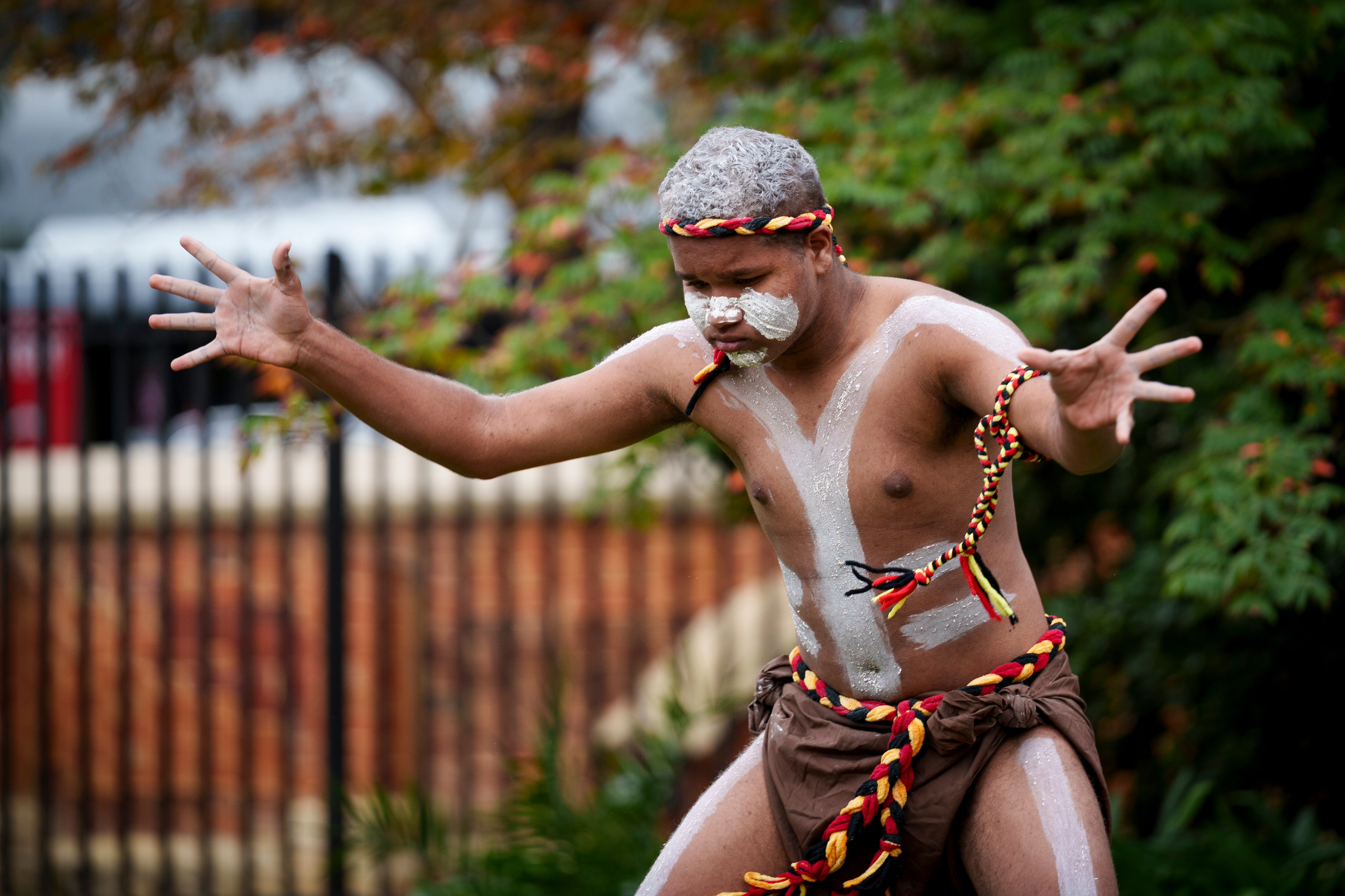 Aboriginal elder performing a Welcome to Country smoking ceremony during Reconciliation Week in Australia