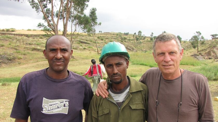 Shane Dolan poses for a photo with some Ethiopian friends.